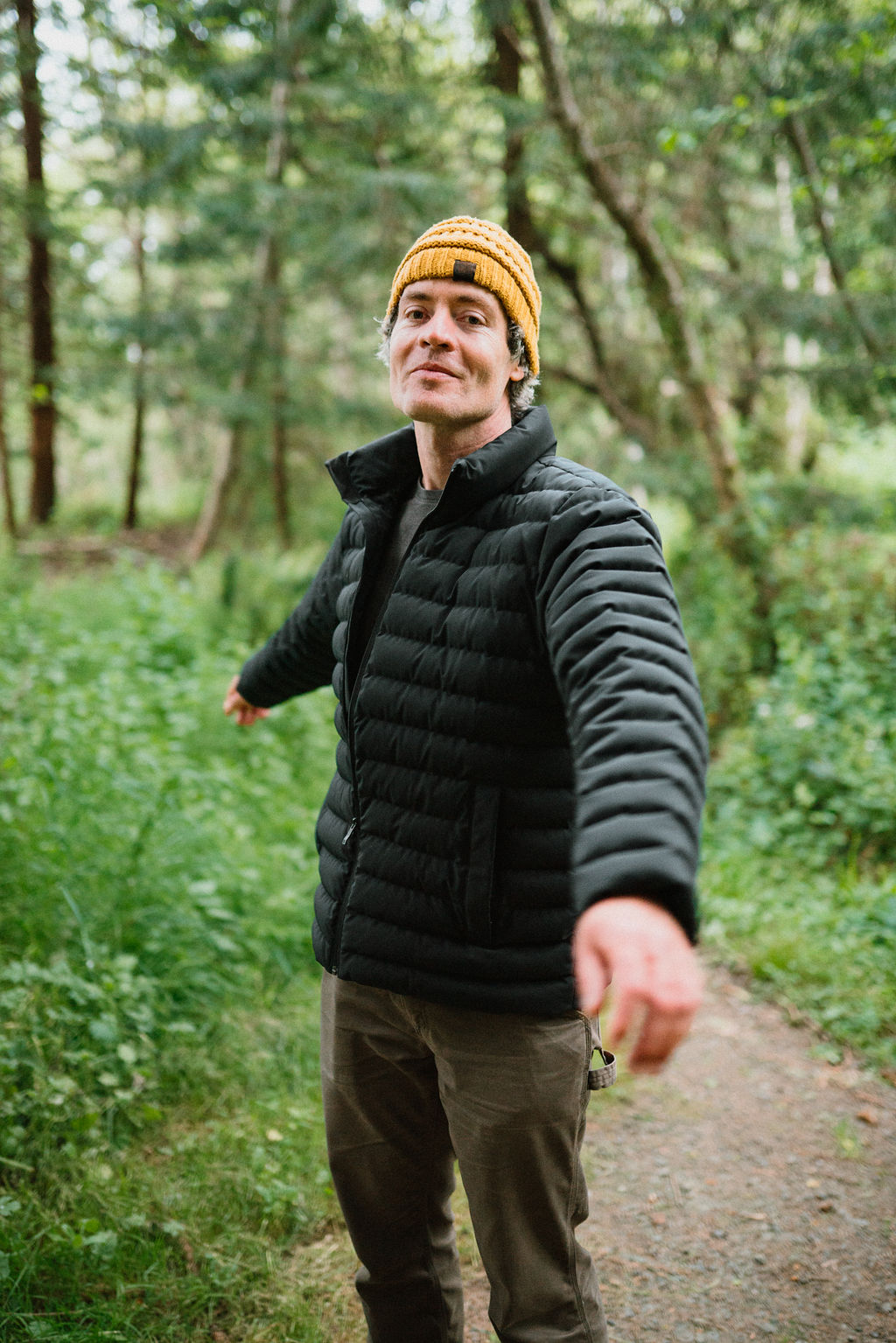 Sean standing in the forest